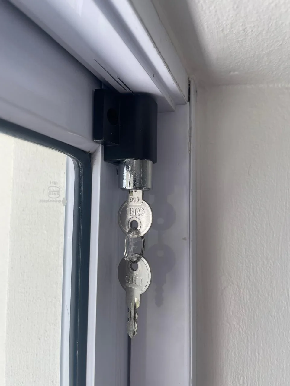 Locksmith fitting a residential door lock in Randburg